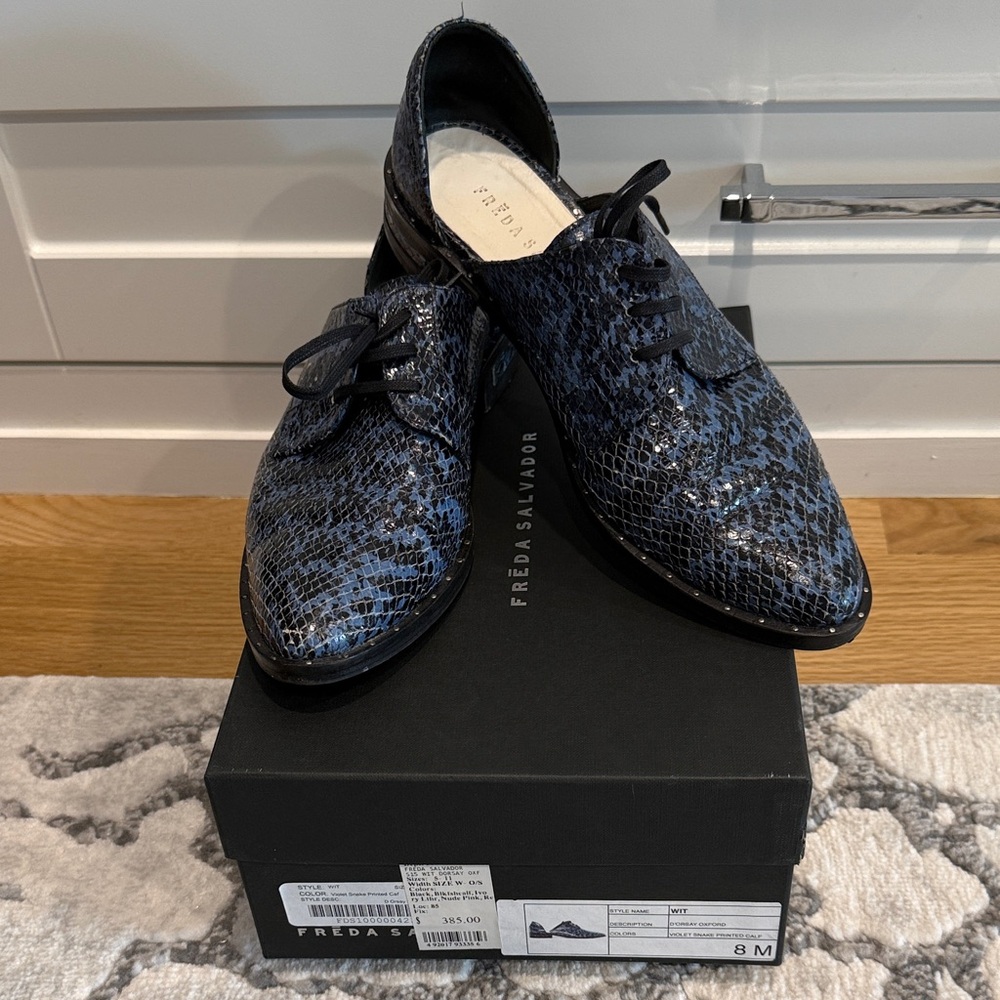 Freda Salvador Women’s Black and Blue Snakeskin Oxfords